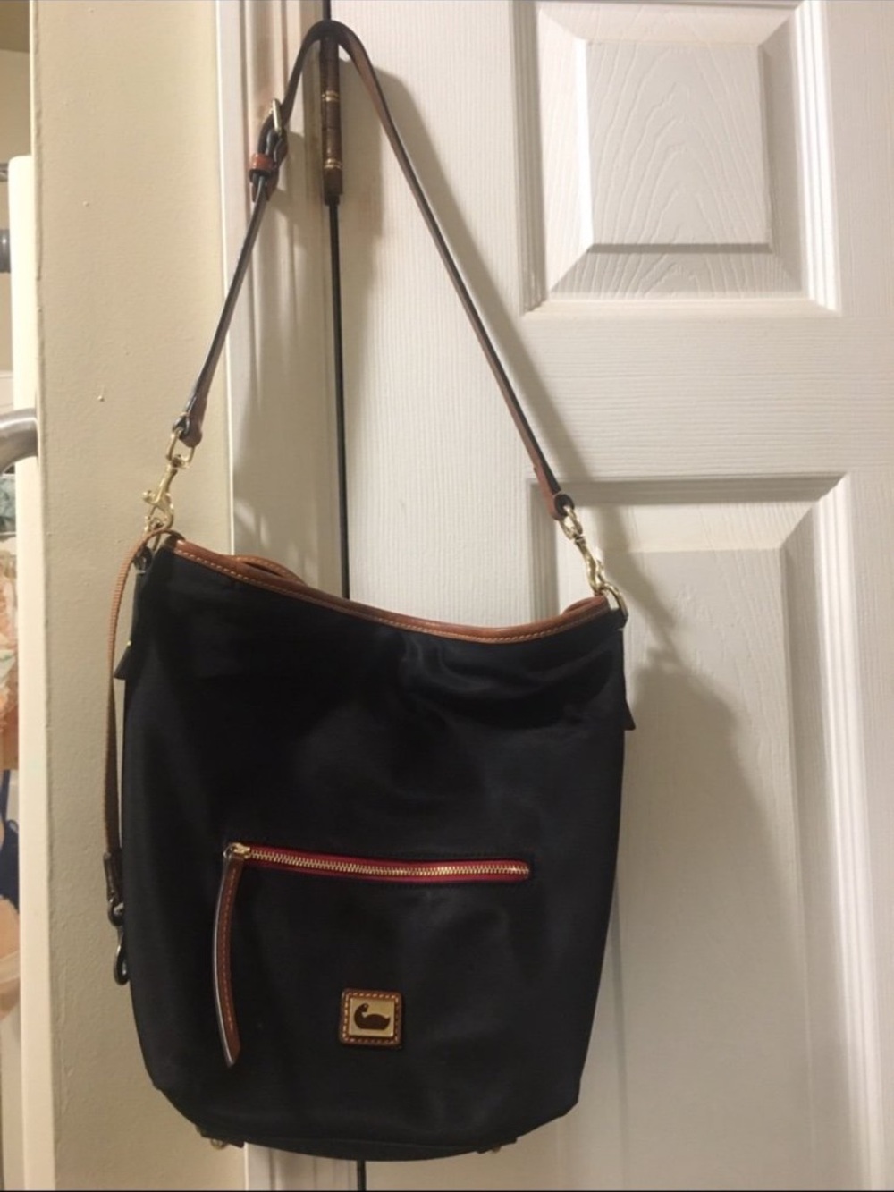 Dooney & Bourke Black Shoulder Bag with Brown Trim and Gold Hardware